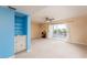Spacious living room with wet bar and balcony access at 6325 Newtown Cir # 25B2, Tampa, FL 33615