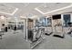 Modern fitness center with treadmills, strength training, and large windows at 6531 Kenava Loop, Palmetto, FL 34221