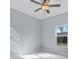 Well-lit bedroom with ceiling fan and window at 6605 24Th S Ave, Tampa, FL 33619