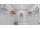 Walk-in closet with white wire shelving, ample storage space, and a clean, organized layout at 6605 24Th S Ave, Tampa, FL 33619