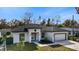 Aerial view of a new construction home showcasing its design and curb appeal at 6605 24Th S Ave, Tampa, FL 33619