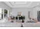 Comfortable living room with marble floors, neutral color palette, ample natural light, and stylish furniture at 6605 24Th S Ave, Tampa, FL 33619