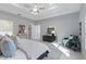 Spacious main bedroom featuring marble floors, tray ceiling, neutral tones, and a relaxing atmosphere at 6605 24Th S Ave, Tampa, FL 33619