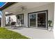 Covered patio featuring outdoor seating, perfect for relaxing or entertaining guests at 6605 24Th S Ave, Tampa, FL 33619