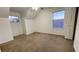 Upstairs bedroom with carpeted floors and a window with a view at 7117 50Th E Ave, Palmetto, FL 34221