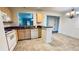 Cozy kitchen featuring light wood cabinets and tile flooring at 7117 50Th E Ave, Palmetto, FL 34221