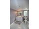 Bathroom with white vanity, marble flooring and shower at 940 Virginia St # 208, Dunedin, FL 34698