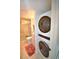 Stackable washer and dryer in a convenient laundry closet at 940 Virginia St # 208, Dunedin, FL 34698