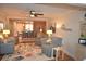 Relaxing living room featuring comfortable seating and hardwood floors at 940 Virginia St # 208, Dunedin, FL 34698