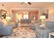 Living room with comfortable seating and area rug at 940 Virginia St # 208, Dunedin, FL 34698