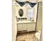 Bathroom with sink, toilet and hexagon tile at 9790 66Th N St # 33, Pinellas Park, FL 33782