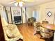 Living room with seating area and wood floors at 9790 66Th N St # 33, Pinellas Park, FL 33782