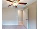 Simple bedroom with an open door to the hallway at 993 Anchor Bend Dr, Ruskin, FL 33570