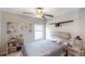 Cozy bedroom with a comfortable bed and airplane decor at 993 Anchor Bend Dr, Ruskin, FL 33570