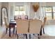 Elegant dining room with a formal table setting for six at 993 Anchor Bend Dr, Ruskin, FL 33570