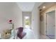 Entryway with tiled floors, chair, and access to backyard at 993 Anchor Bend Dr, Ruskin, FL 33570