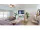 Spacious living room with large TV and comfortable seating at 993 Anchor Bend Dr, Ruskin, FL 33570