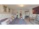 Main bedroom with a large bed, dresser, and walk-in closet at 993 Anchor Bend Dr, Ruskin, FL 33570