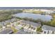 Aerial view of townhouses near a lake at 10108 Newel Valley Loop, Riverview, FL 33569