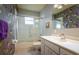 Bathroom with a tub, shower, and vanity at 1015 El Rancho Dr, Sun City Center, FL 33573