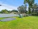 Spacious backyard with trampoline and playset at 10603 Coquita Ln, Tampa, FL 33618