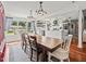 Farmhouse-style dining room with large wooden table at 10603 Coquita Ln, Tampa, FL 33618