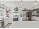 Modern kitchen with stainless steel appliances and white cabinets at 10603 Coquita Ln, Tampa, FL 33618