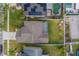 Directly above view of house showing backyard, pool, and landscaping at 11607 Branch Mooring Dr, Tampa, FL 33635