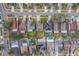 Aerial image showing a neighborhood of houses with solar panels and pools at 11607 Branch Mooring Dr, Tampa, FL 33635