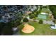 Aerial view of homes, park, and recreational facilities at 11607 Branch Mooring Dr, Tampa, FL 33635