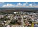 Aerial view of a residential neighborhood with houses and green spaces at 11607 Branch Mooring Dr, Tampa, FL 33635