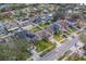 Aerial view of a house with a pool in a residential neighborhood at 11607 Branch Mooring Dr, Tampa, FL 33635