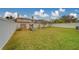 Large backyard with playset and grassy area at 11607 Branch Mooring Dr, Tampa, FL 33635