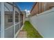 Brick pathway leads to a grassy backyard at 11607 Branch Mooring Dr, Tampa, FL 33635