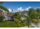 Single-story home with a well-maintained lawn at 11607 Branch Mooring Dr, Tampa, FL 33635