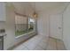 Kitchen nook with tile floors and view of backyard at 11607 Branch Mooring Dr, Tampa, FL 33635