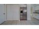 Modern kitchen features stainless steel appliances and white cabinets at 11607 Branch Mooring Dr, Tampa, FL 33635