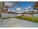 Screened patio with view of backyard at 11607 Branch Mooring Dr, Tampa, FL 33635