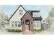 Charming craftsman home with light green siding and a brick entryway at 1212 E Comanche Ave, Tampa, FL 33604