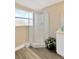 Bathroom with corner shower, modern vanity and flooring at 12918 Cambridge Ave, Tampa, FL 33624