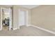 Spacious bedroom with carpet flooring and ample closet space at 12918 Cambridge Ave, Tampa, FL 33624