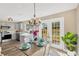 Bright dining area with French doors leading to a patio at 12918 Cambridge Ave, Tampa, FL 33624