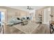 Bright and airy living room with a neutral color palette and stylish furniture at 12918 Cambridge Ave, Tampa, FL 33624