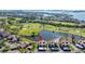 Condo community near golf course and body of water at 1322 Pelican Creek Xing # C, St Petersburg, FL 33707