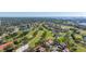 Aerial view of community near golf course and water at 1322 Pelican Creek Xing # C, St Petersburg, FL 33707