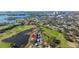 Aerial view of condo, highlighting location near water and golf at 1322 Pelican Creek Xing # C, St Petersburg, FL 33707