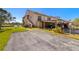 Two-story condo building with covered parking and waterfront views at 1322 Pelican Creek Xing # C, St Petersburg, FL 33707