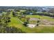 Aerial view of a lush green golf course at 1322 Pelican Creek Xing # C, St Petersburg, FL 33707