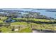 Aerial view of a golf course near the waterfront at 1322 Pelican Creek Xing # C, St Petersburg, FL 33707