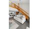 Wooden staircase leading to an upper level loft at 1322 Pelican Creek Xing # C, St Petersburg, FL 33707